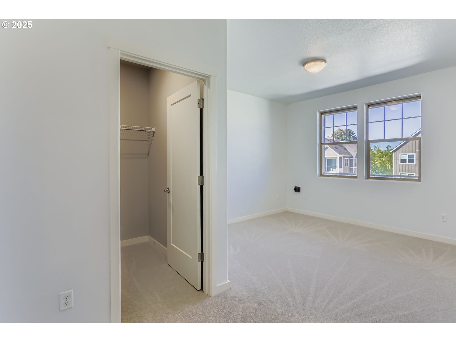 16449 Northwest Chadwick Way, Unit 305 Portland, OR 97229 - Photo 6 of 11 a view of an empty room with a window