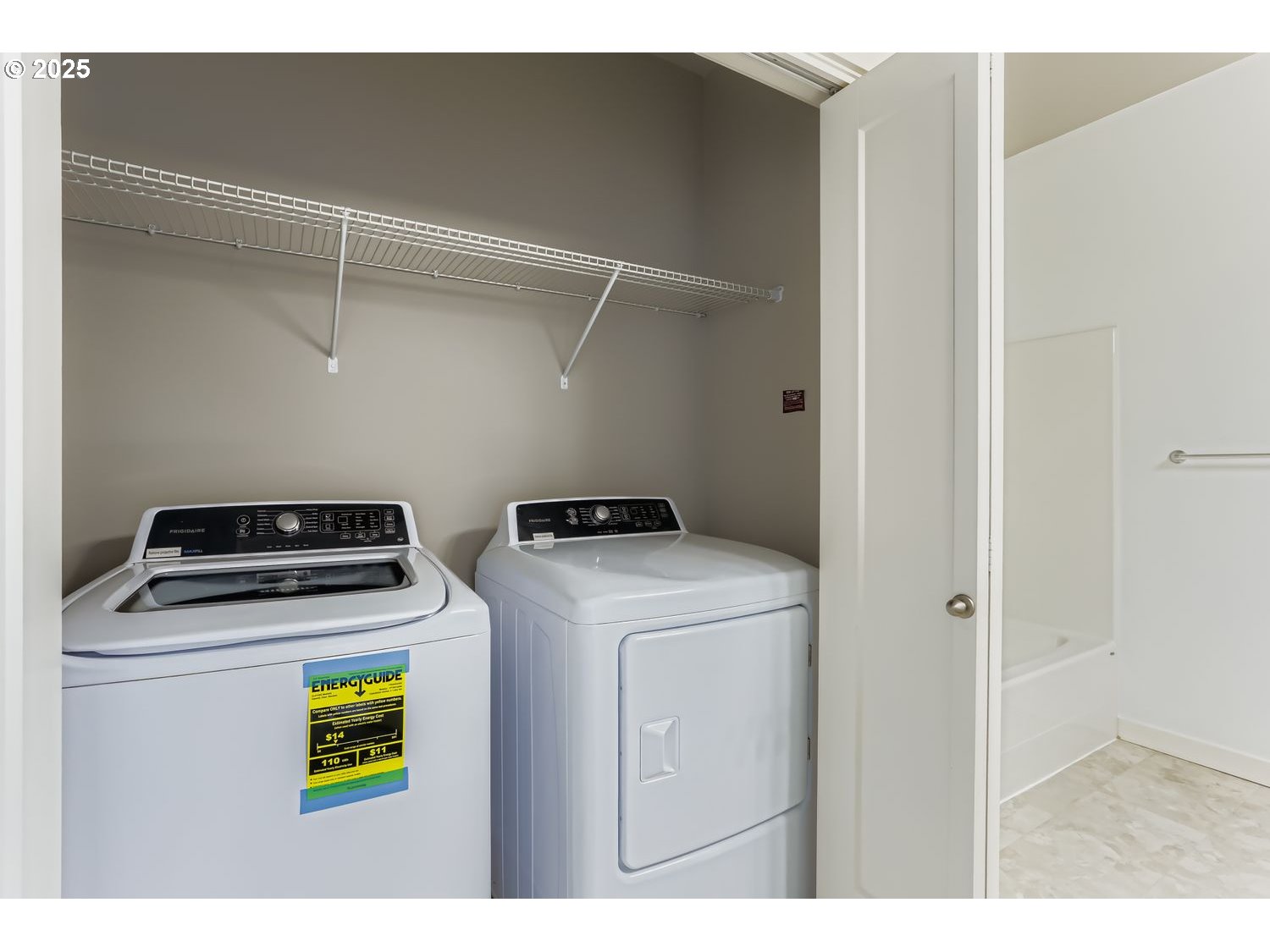 16449 Northwest Chadwick Way, Unit 305 Portland, OR 97229 - Photo 10 of 11 a utility room with dryer and washer