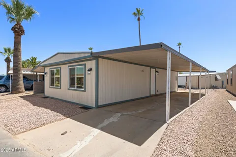 a front view of a house with a garage