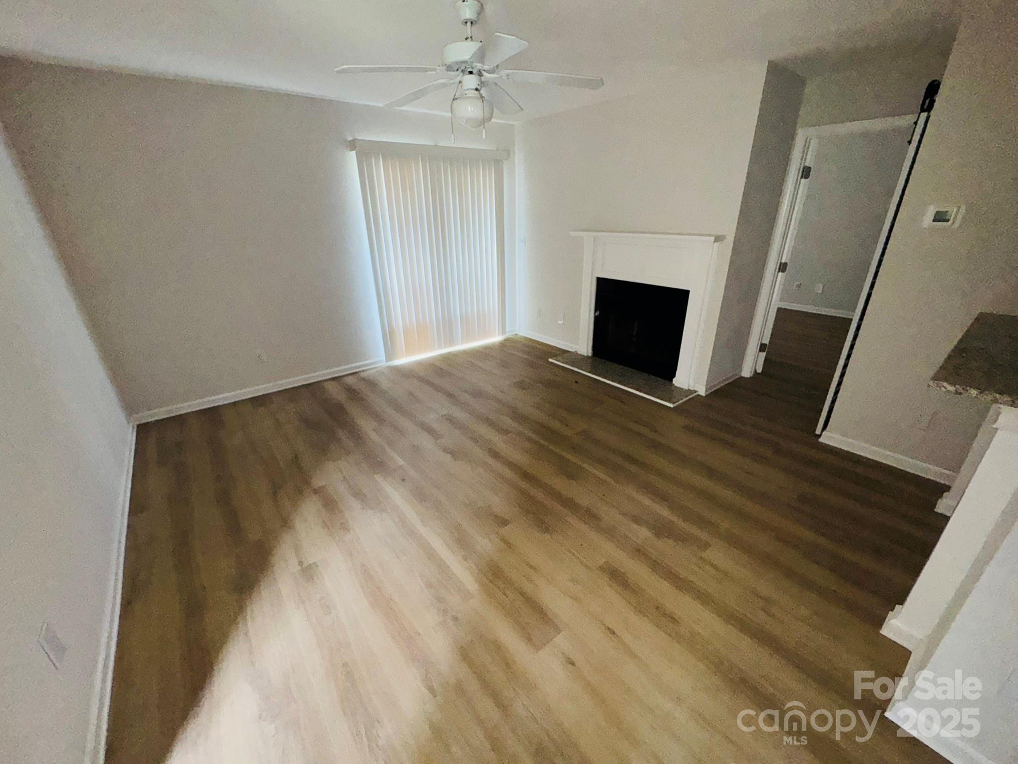 229 Windsor Point Road Columbia, SC 29223 - Photo 1 of 8 a view of empty room with wooden floor