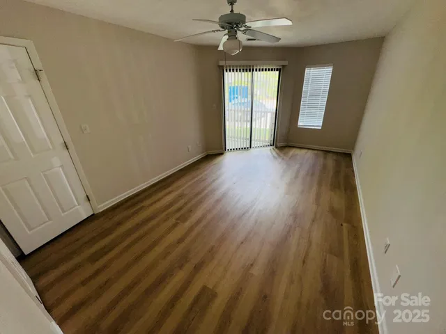 a view of an empty room and window