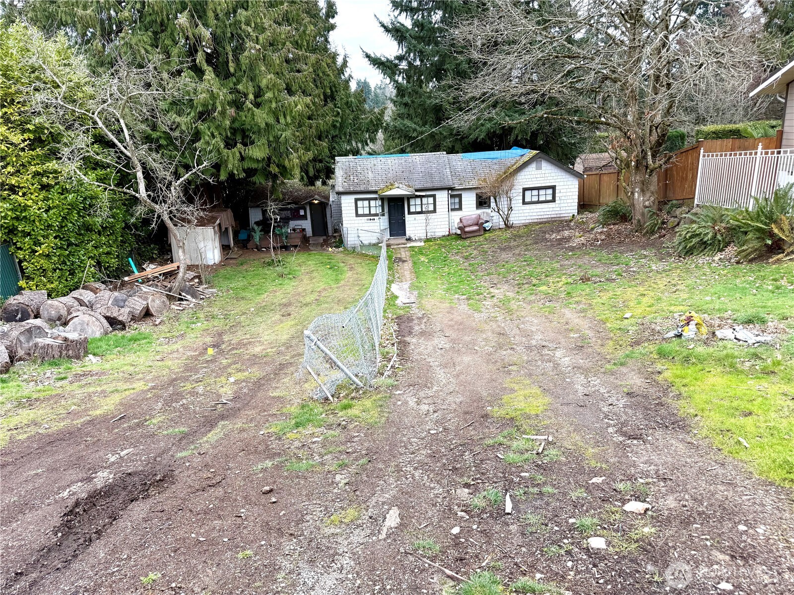 11040 11th Avenue Southwest Seattle, WA 98146 - Photo 2 of 18 a house view with a backyard space