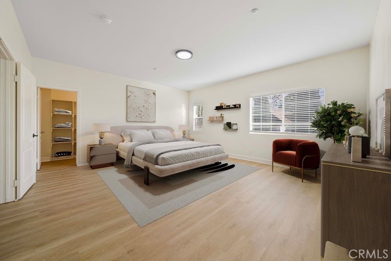 527 Fifth Avenue, Unit B Arcadia, CA 91006 - Photo 17 of 33 a bedroom with furniture and a potted plant