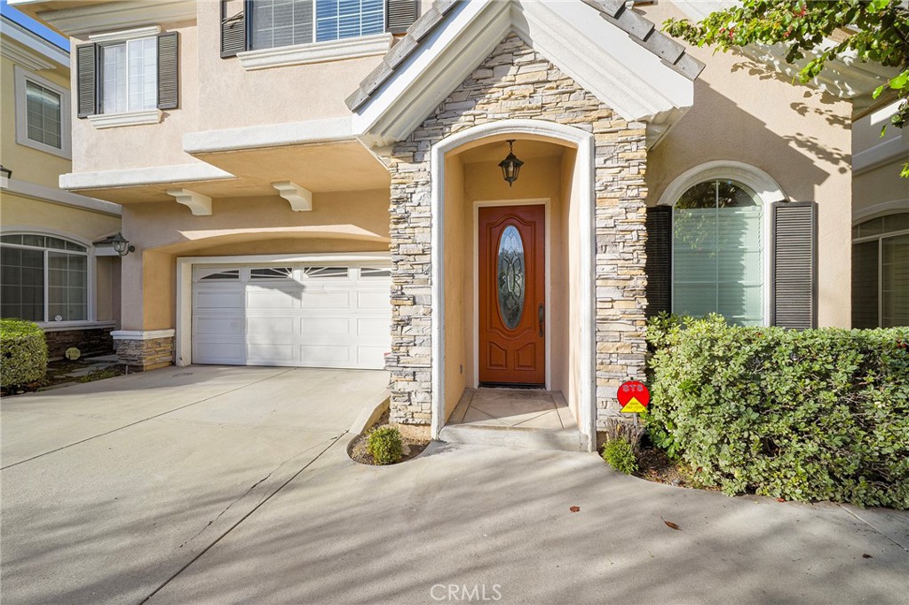 527 Fifth Avenue, Unit B Arcadia, CA 91006 - Photo 2 of 33 a front view of a house with garden