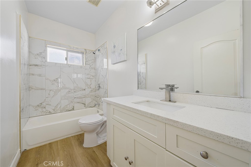 527 Fifth Avenue, Unit B Arcadia, CA 91006 - Photo 26 of 33 a bathroom with a sink a toilet and shower
