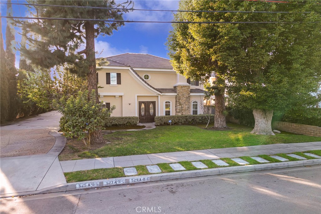 527 Fifth Avenue, Unit B Arcadia, CA 91006 - Photo 33 of 33 a front view of house with yard and green space
