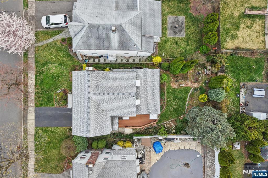 401 Walnut Street Nutley, NJ 07110 - Photo 25 of 25 an aerial view of a house with outdoor space pool patio and outdoor seating