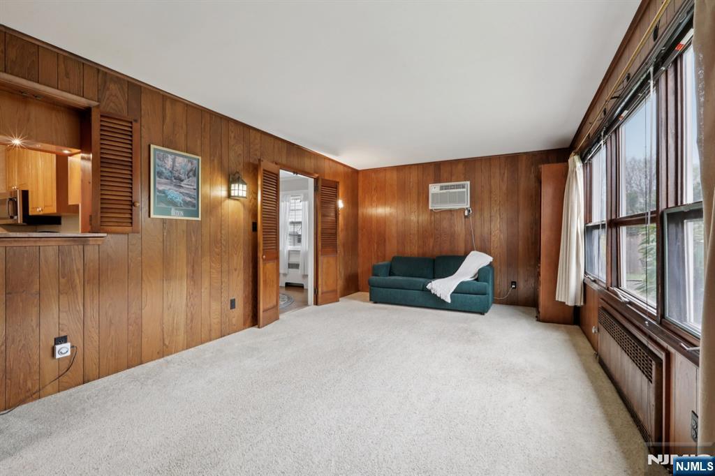 401 Walnut Street Nutley, NJ 07110 - Photo 9 of 25 a bed room with a bed and two large window