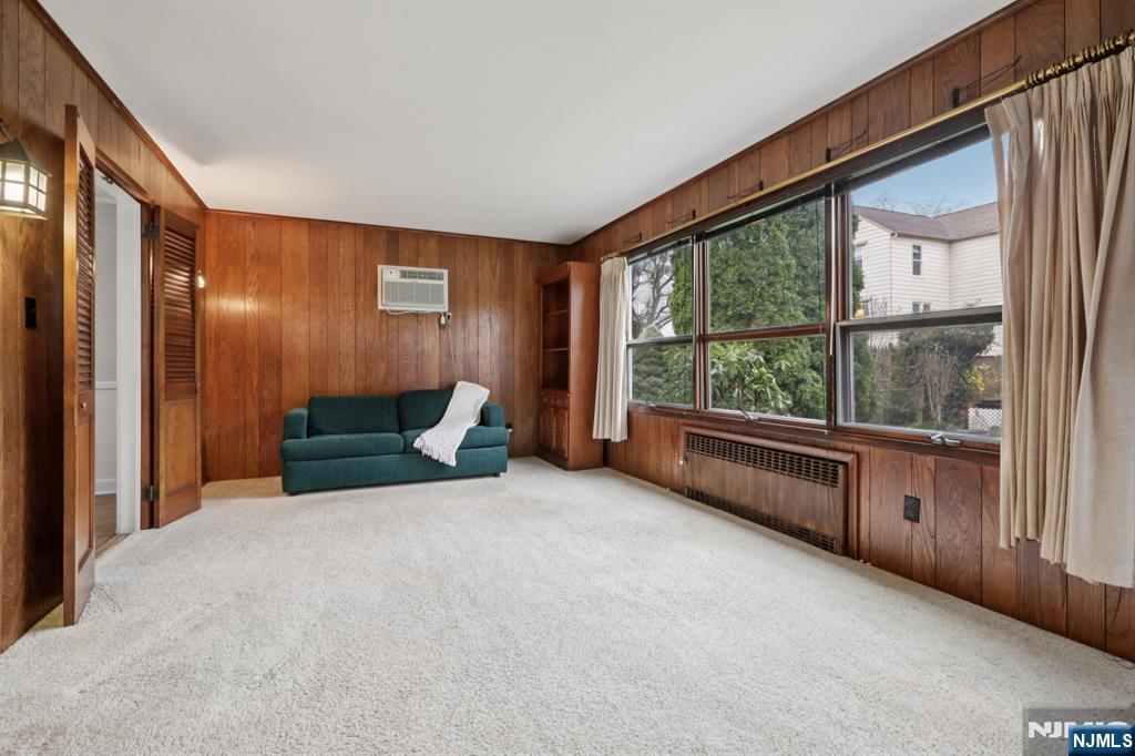 401 Walnut Street Nutley, NJ 07110 - Photo 10 of 25 a view of a livingroom with furniture and staircase