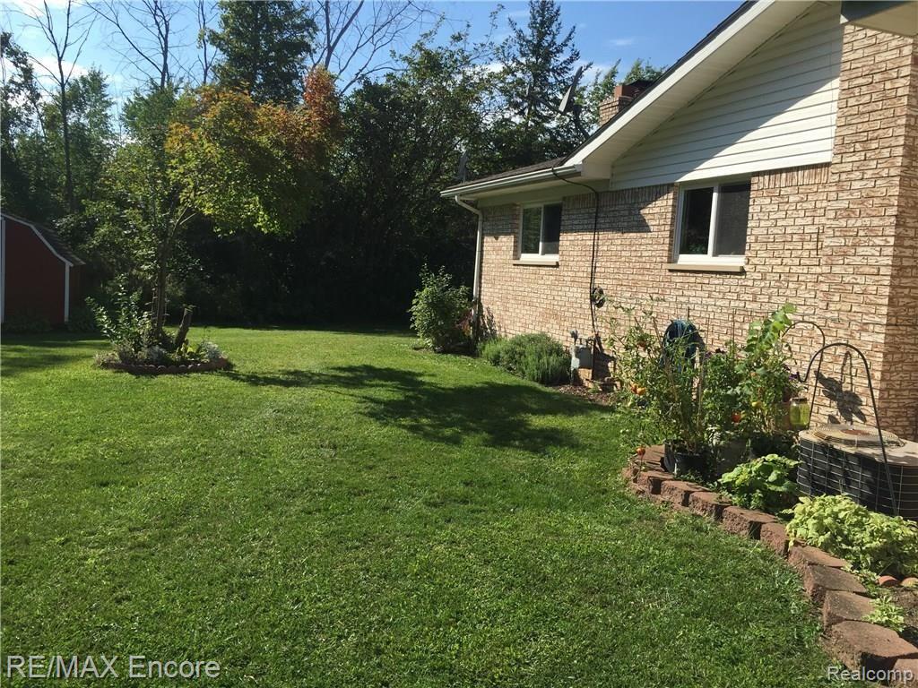 64840 Miller Road Washington, MI 48095 - Photo 7 of 39 side yard 4.JPG