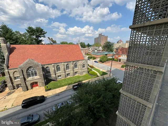 a view of a city with furniture