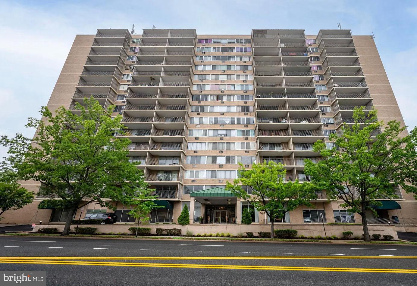 1401 Pennsylvania Avenue, Unit 612 Wilmington, DE 19806 - Photo 29 of 37 a view of a tall building with a swimming pool