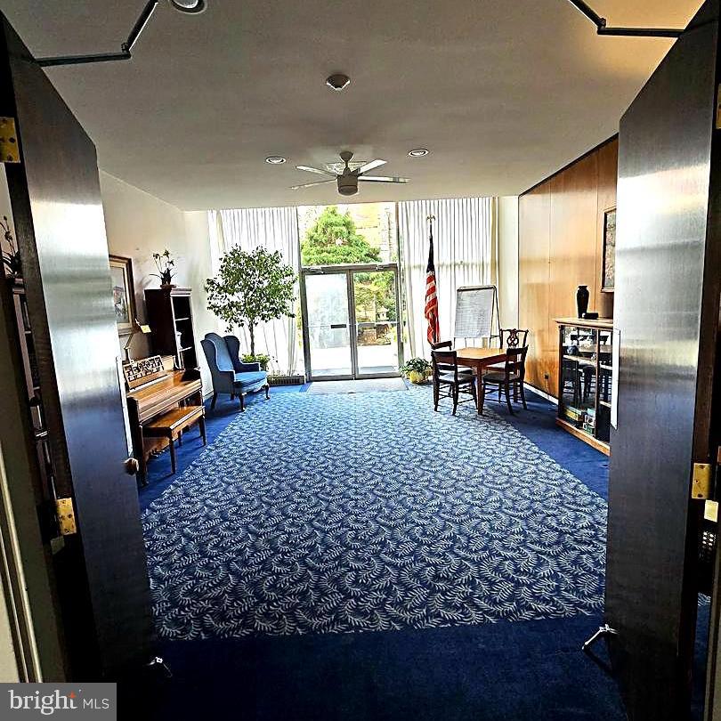1401 Pennsylvania Avenue, Unit 612 Wilmington, DE 19806 - Photo 31 of 37 a living room with furniture window and wooden floor