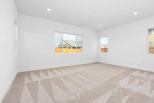 an empty room with windows