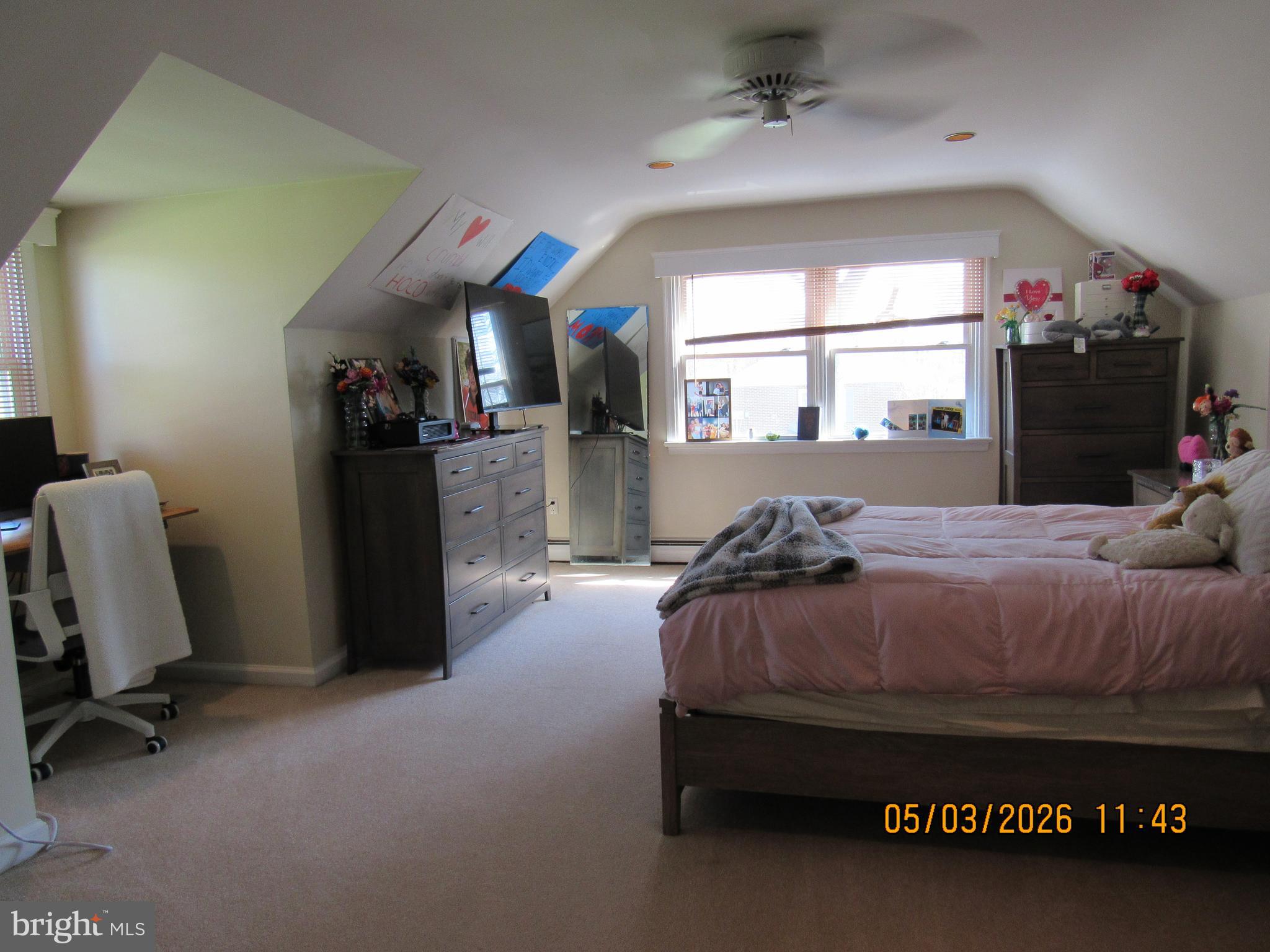 1276 Stump Hall Road Collegeville, PA 19426 - Photo 16 of 46 a bedroom with a bed closet and a window