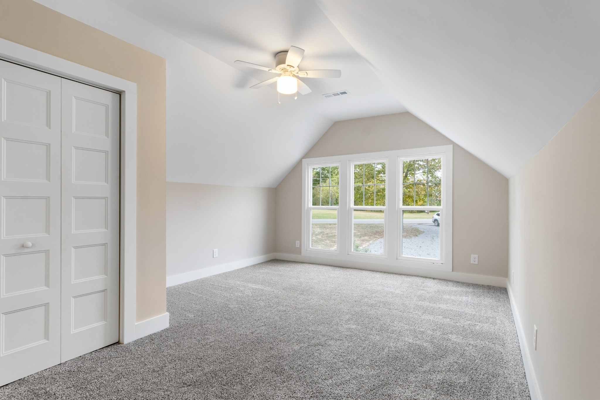 2028 Lock B Road North Clarksville, TN 37043 - Photo 32 of 47 an empty room with windows and chandelier fan