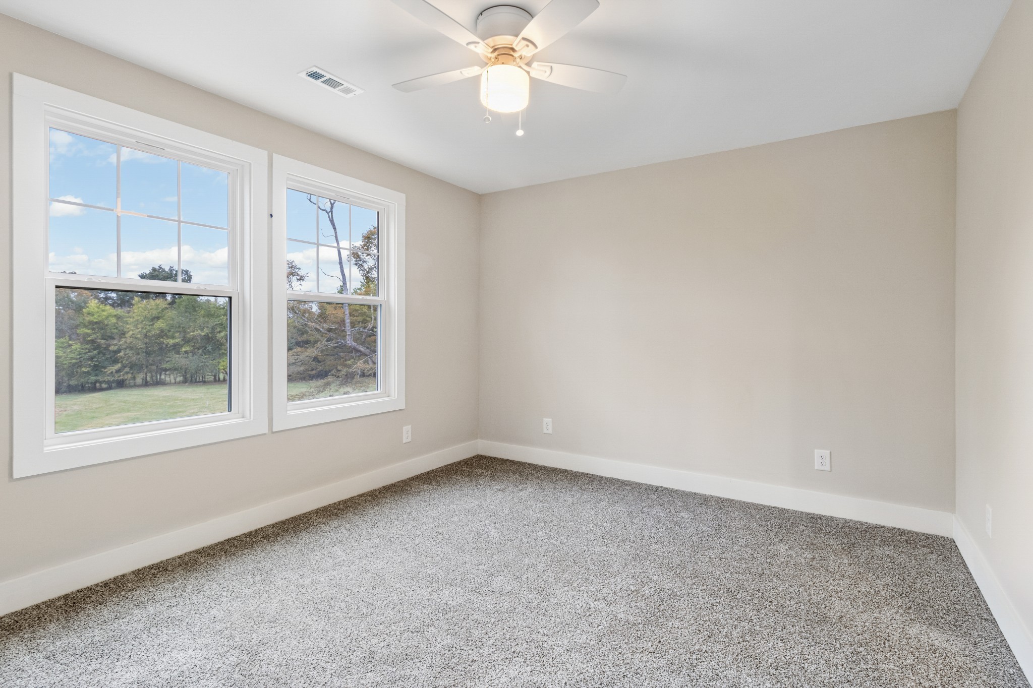 2028 Lock B Road North Clarksville, TN 37043 - Photo 36 of 47 an empty room with a window and a fan