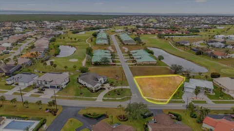 an aerial view of a house with a swimming pool