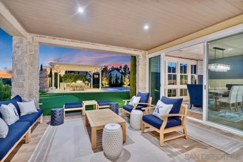 a outdoor space with patio the couches and a potted plant on the table