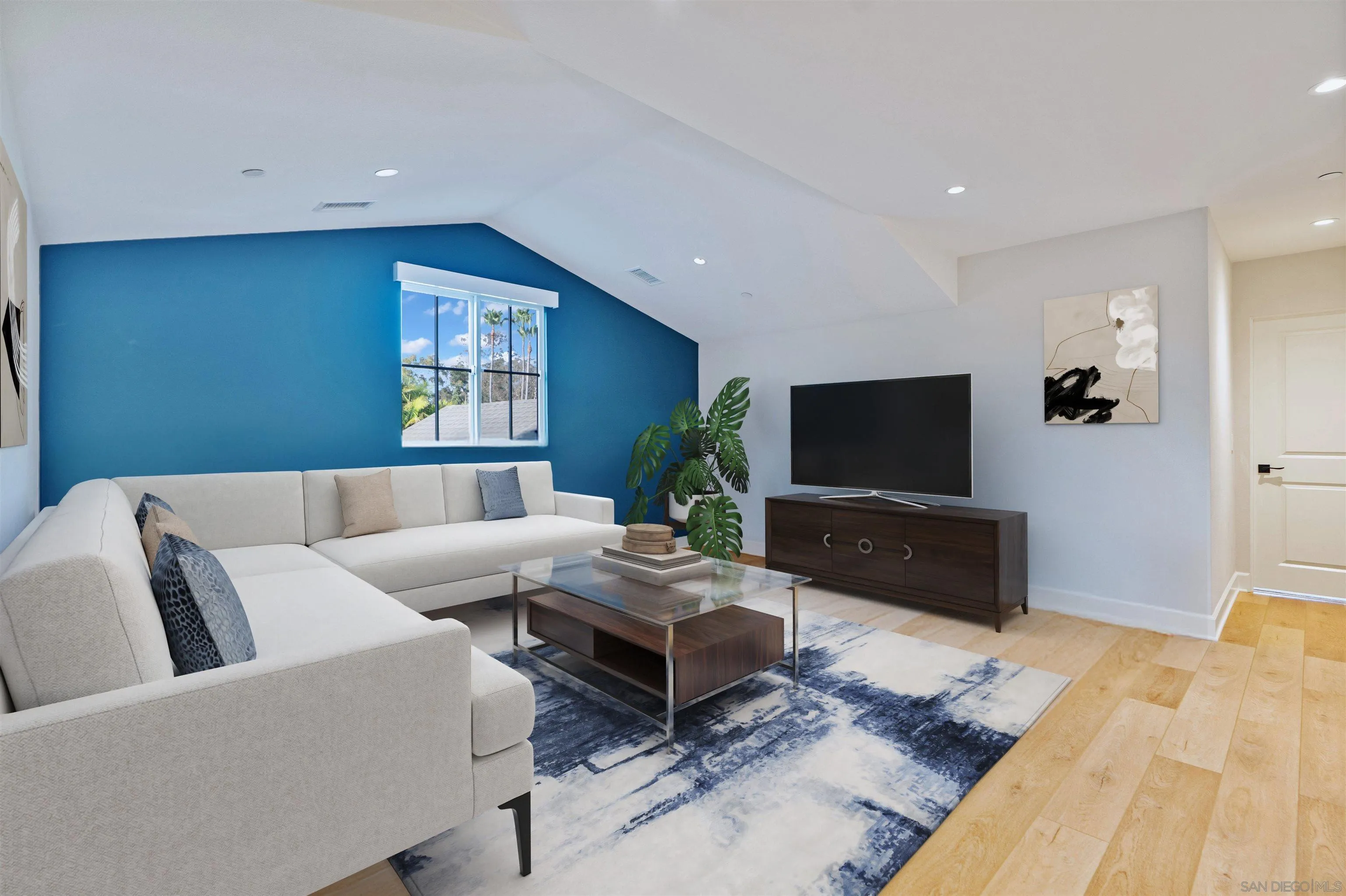 1259 Berryman Canyon Encinitas, CA 92024 - Photo 21 of 36 a living room with furniture and a flat screen tv