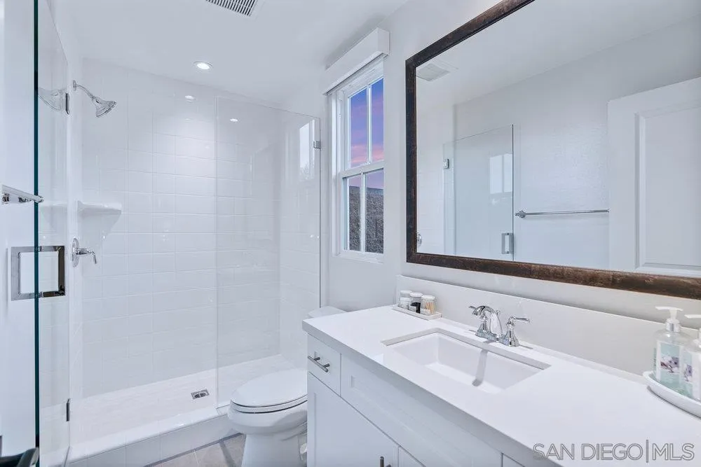 1259 Berryman Canyon Encinitas, CA 92024 - Photo 34 of 36 a bathroom with a sink toilet and shower