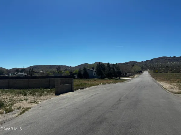 a view of house with mountain view