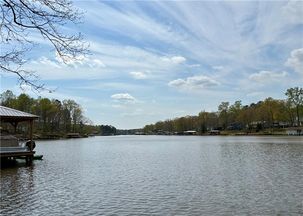139 Bear Creek Road Eatonton, GA 31024 - Photo 8 of 8 a view of lake with outdoor space