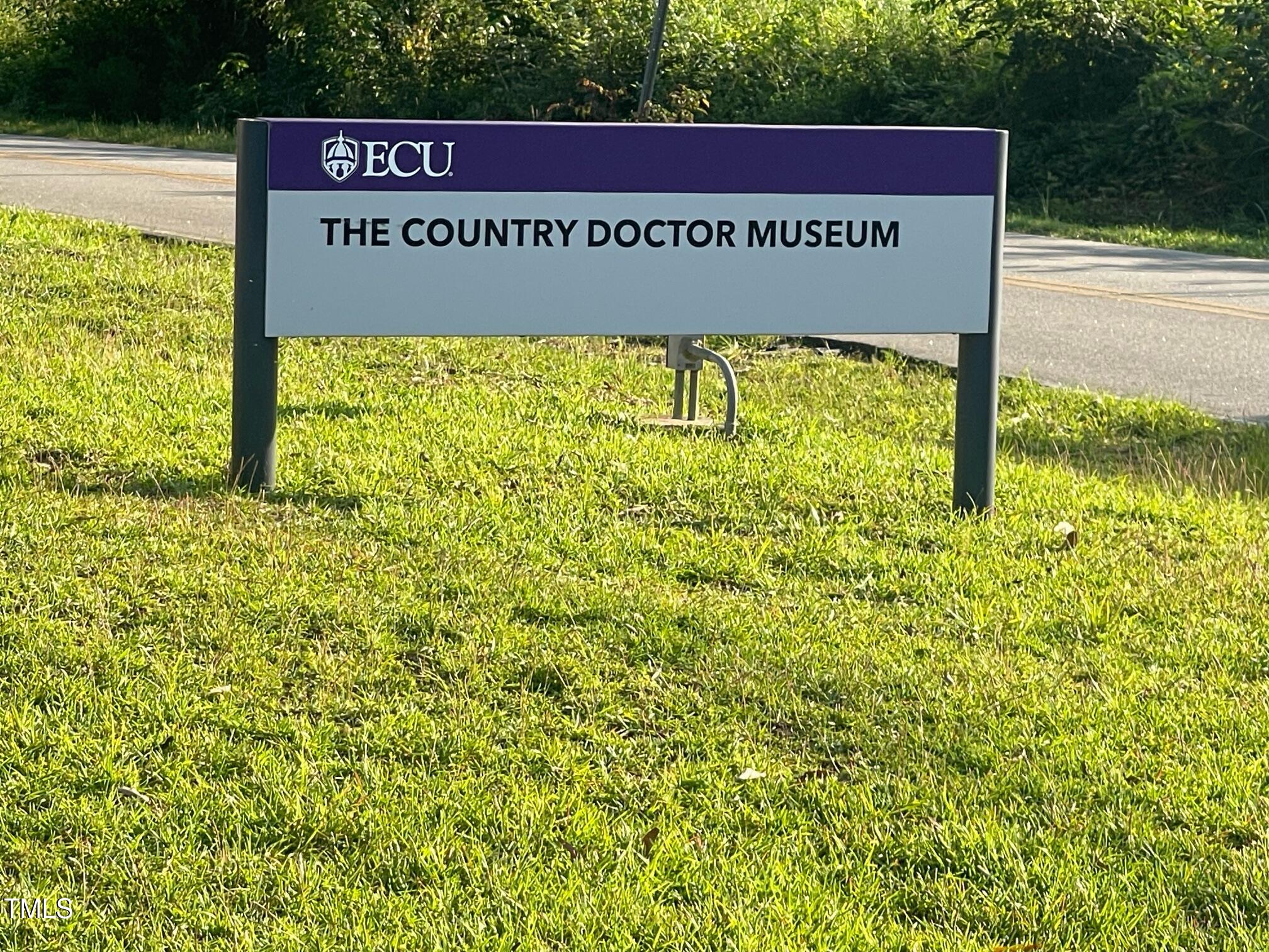 4020 Fletcher Road Bailey, NC 27807 - Photo 27 of 30 a sign on the side of a building