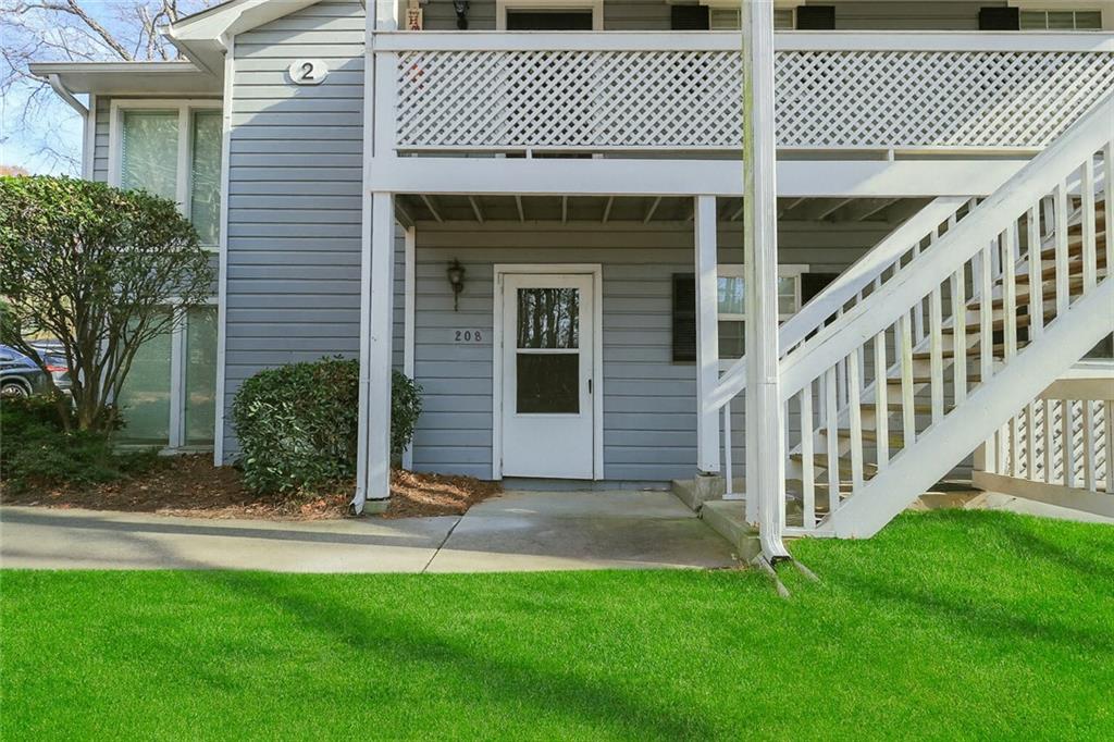 208 Natchez Trace Sandy Springs, GA 30350 - Photo 2 of 15 a view of a house with a yard