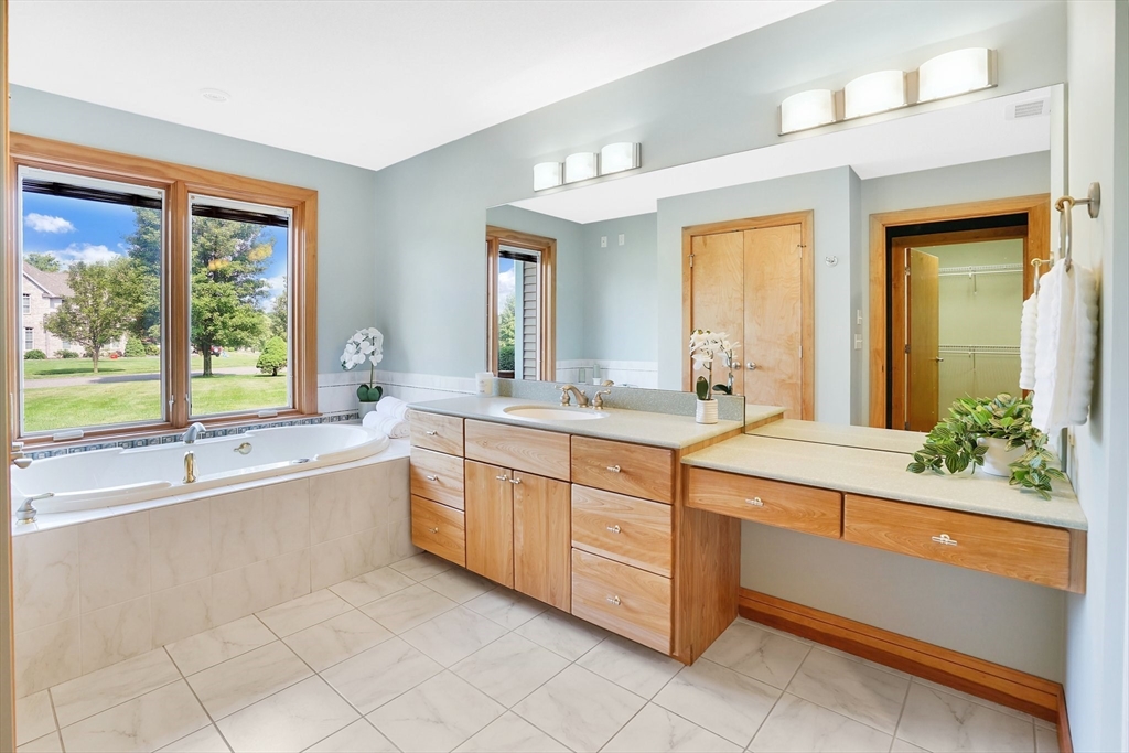 89 Nottingham Drive East Longmeadow, MA 01028 - Photo 18 of 40 a large bathroom with a large tub and sink