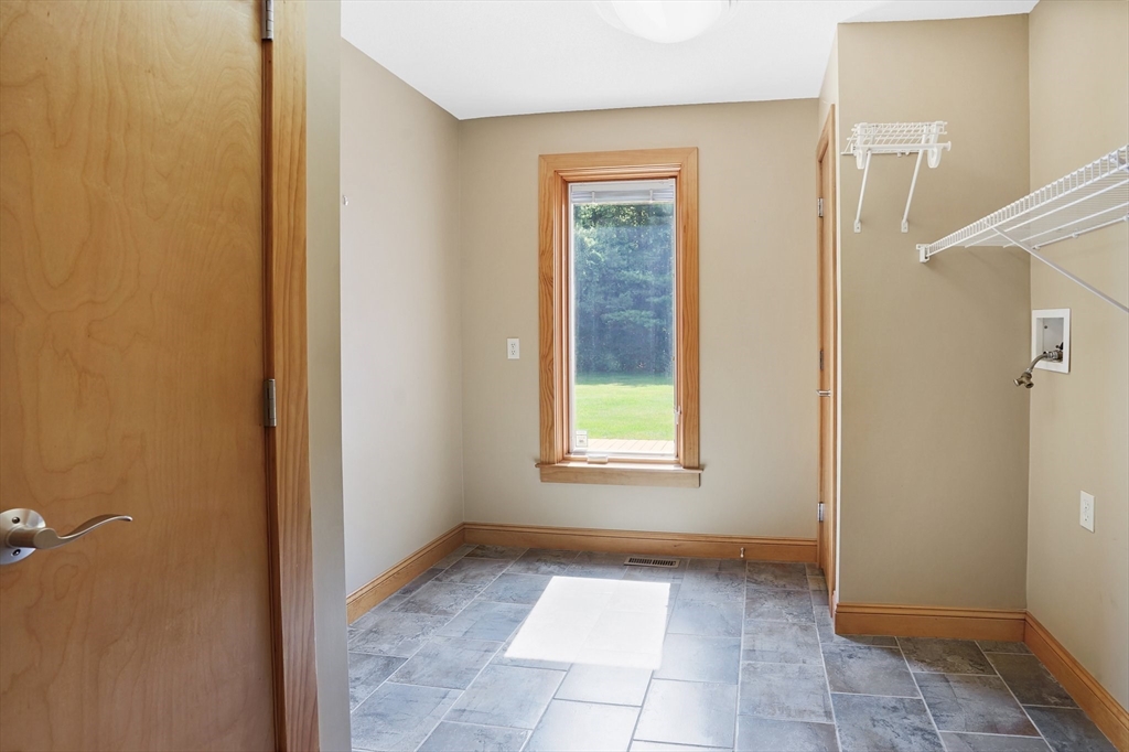 89 Nottingham Drive East Longmeadow, MA 01028 - Photo 24 of 40 a view of an empty room with window and a bathroom
