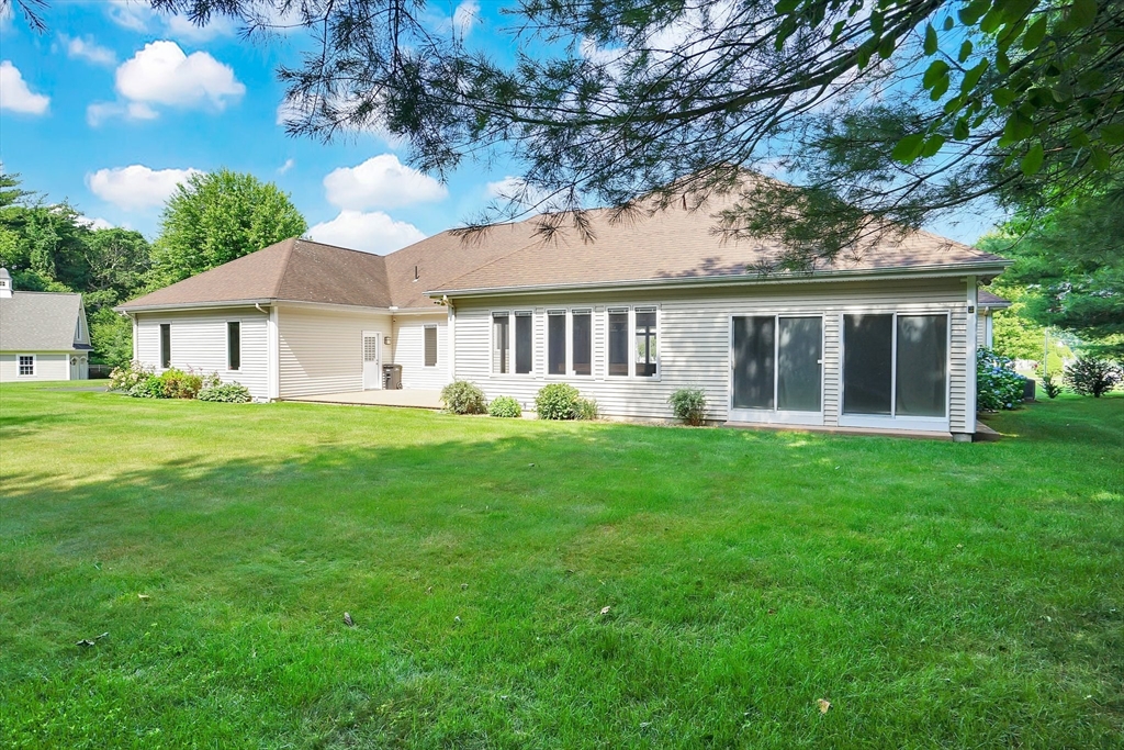 89 Nottingham Drive East Longmeadow, MA 01028 - Photo 37 of 40 a front view of house with yard and green space