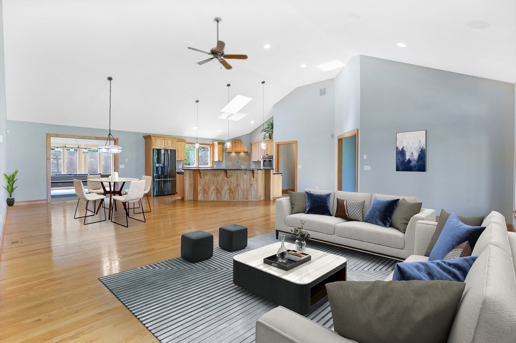 89 Nottingham Drive East Longmeadow, MA 01028 - Photo 6 of 40 a living room with furniture kitchen view and a wooden floor