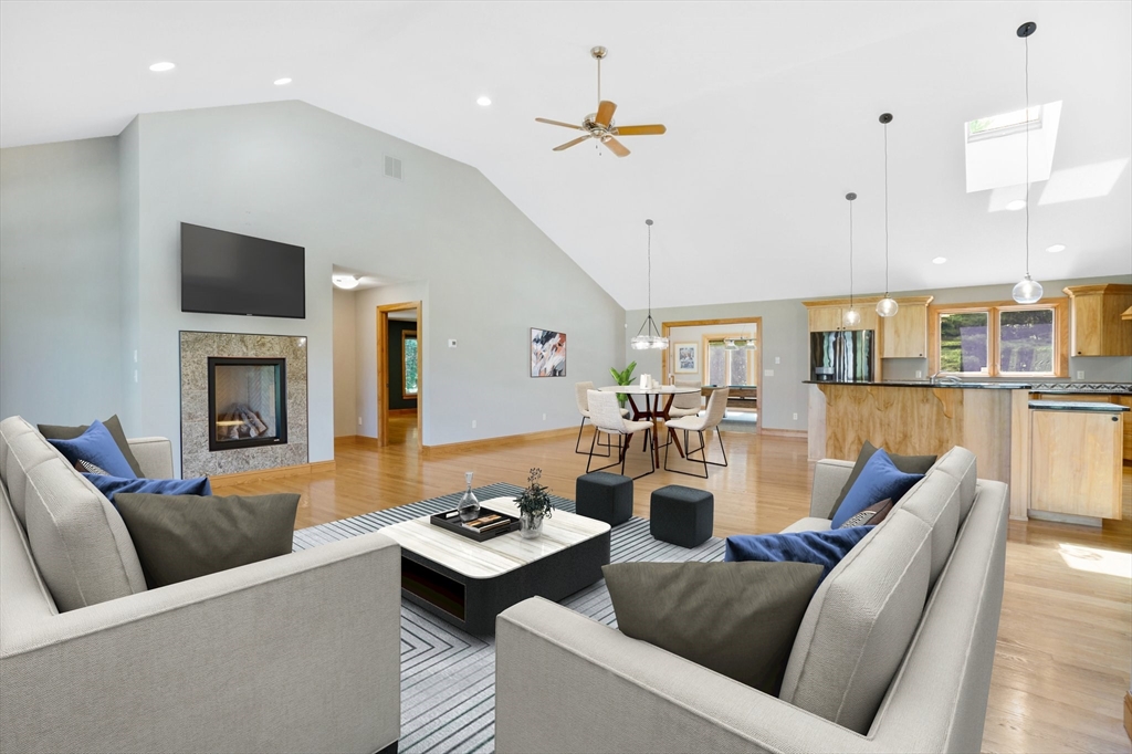 89 Nottingham Drive East Longmeadow, MA 01028 - Photo 8 of 40 a living room with furniture kitchen view and a fireplace