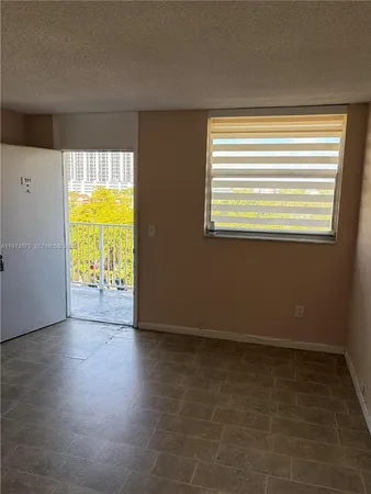 a kitchen with a sink and a window
