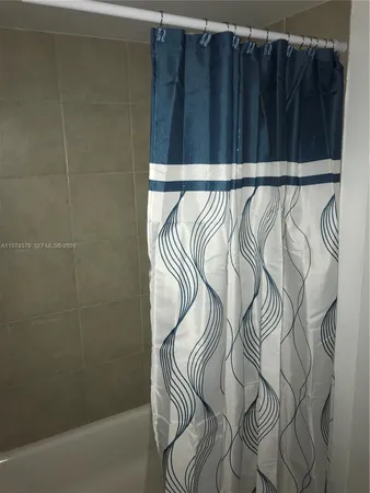 a close up of a shower curtain