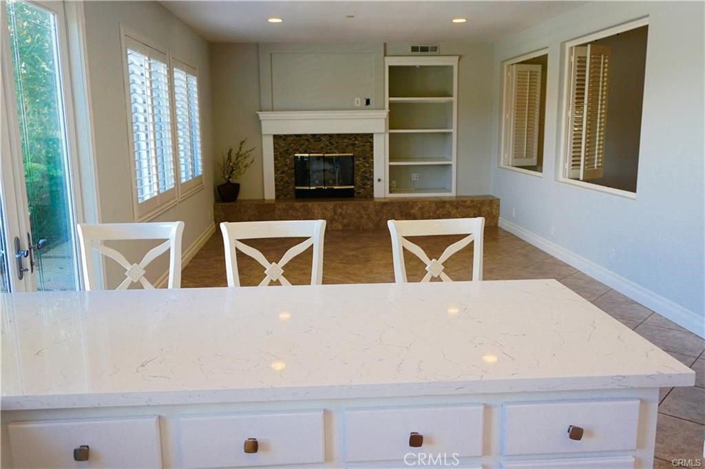 24065 Atun Street Dana Point, CA 92629 - Photo 6 of 30 Kitchen and Family room