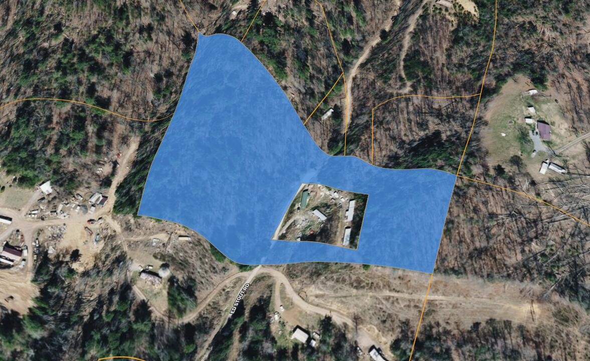 122 Ed Stout Road Hampton, TN 37658 - Photo 3 of 6 a view of a couches in a backyard