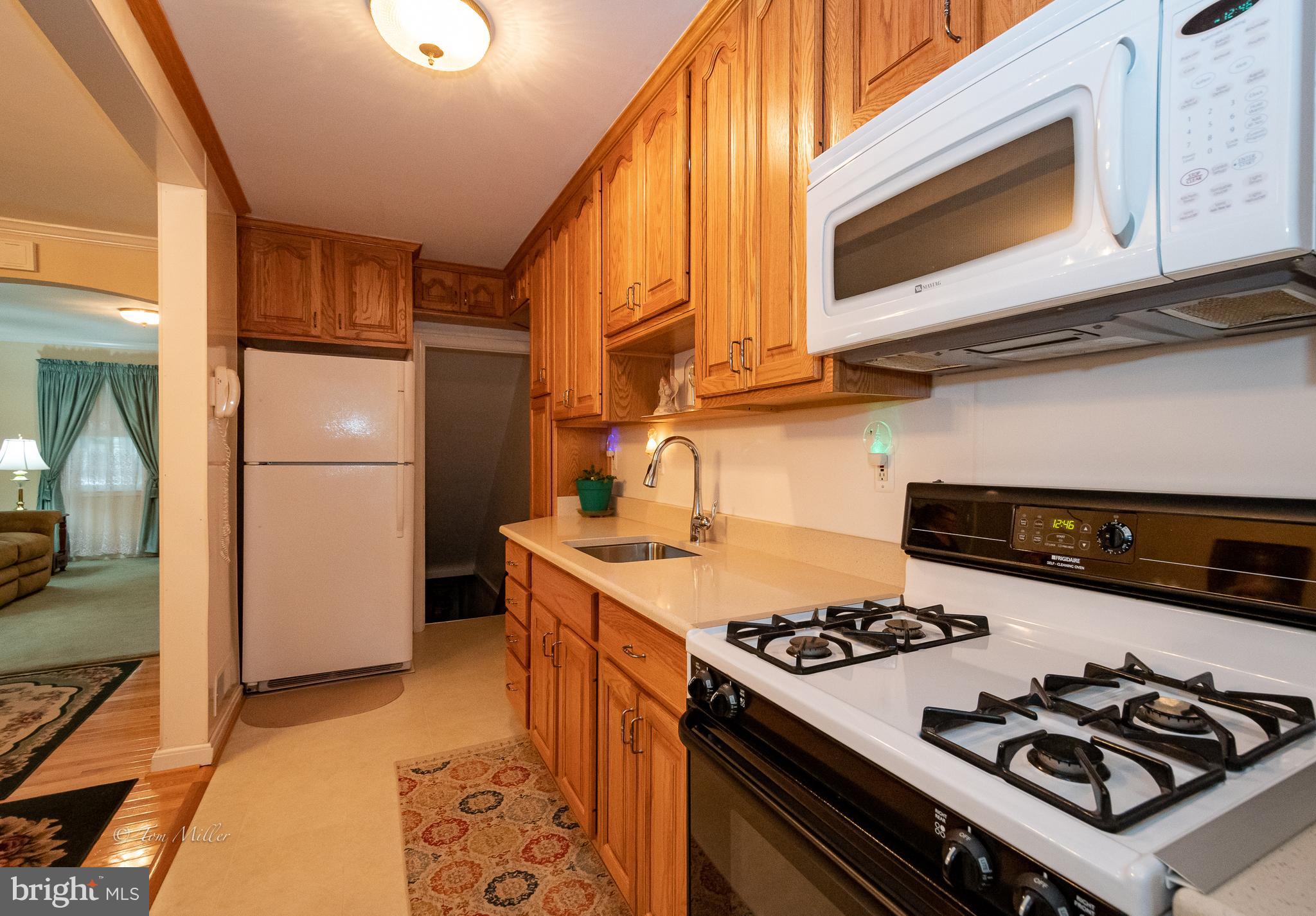 8329 Kendale Road Baltimore, MD 21234 - Photo 8 of 35 Updated kitchen has Gas Stove & Built-in Microwave