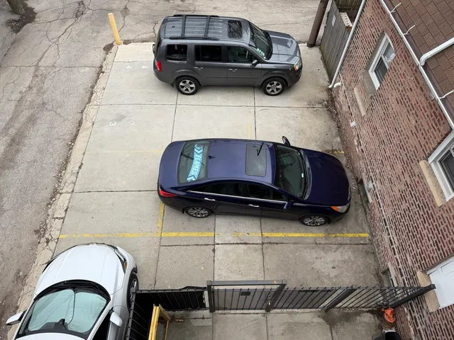 a car parked in front of a bathroom