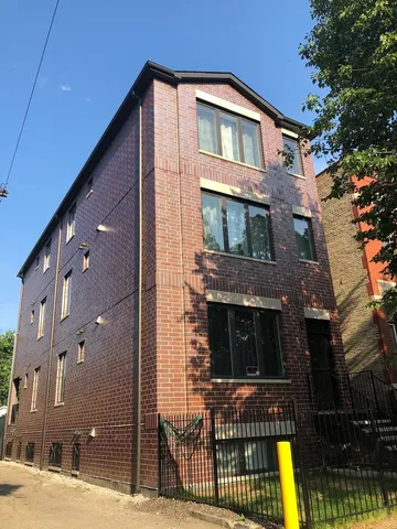 a front view of a house with swimming pool