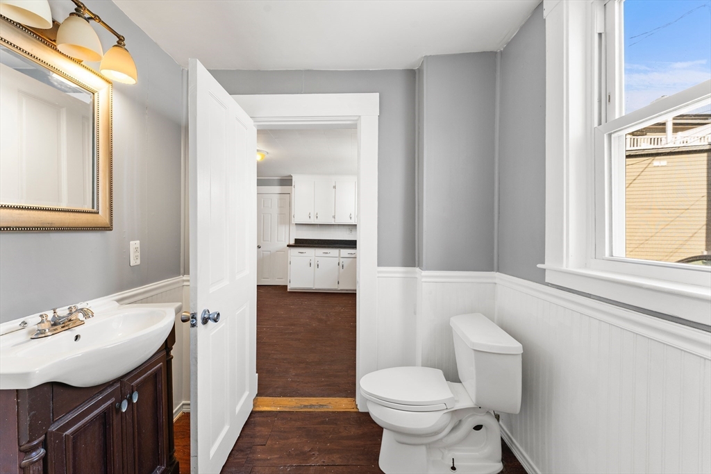 211 Burrill Street Swampscott, MA 01907 - Photo 18 of 39 a bathroom with a sink toilet and shower