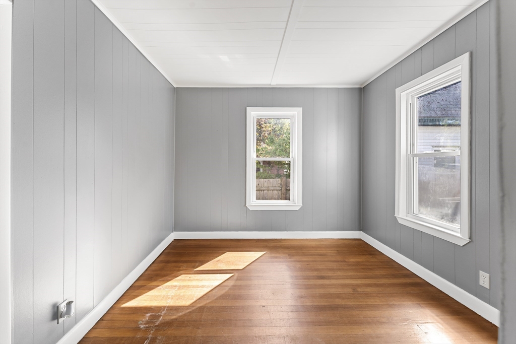 211 Burrill Street Swampscott, MA 01907 - Photo 19 of 39 a view of empty room with wooden floor