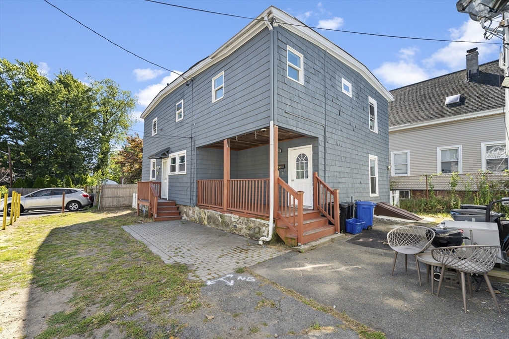 211 Burrill Street Swampscott, MA 01907 - Photo 2 of 39 a view of a house with a yard
