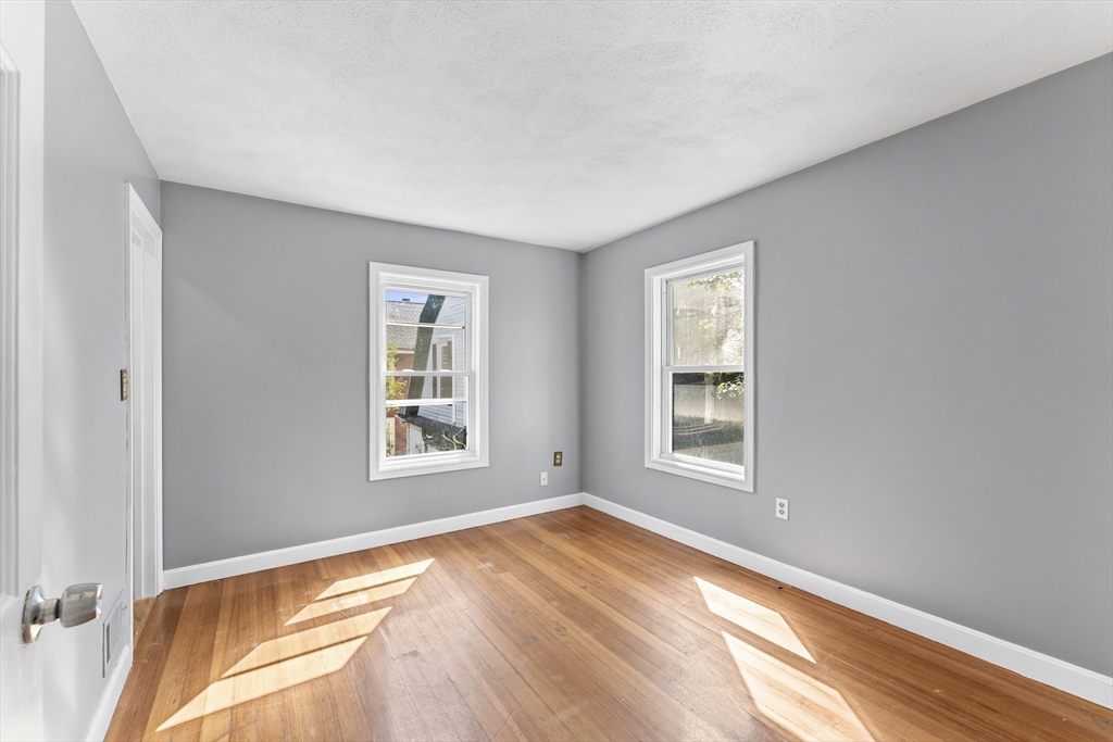 211 Burrill Street Swampscott, MA 01907 - Photo 24 of 39 a view of an empty room with a window