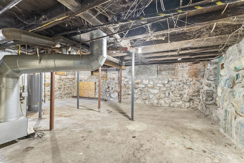 211 Burrill Street Swampscott, MA 01907 - Photo 39 of 39 a view of a room with racks on the wall