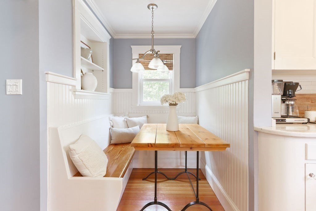 1097 Greendale Avenue Needham, MA 02492 - Photo 12 of 36 a view of a dining room with furniture window and wooden floor
