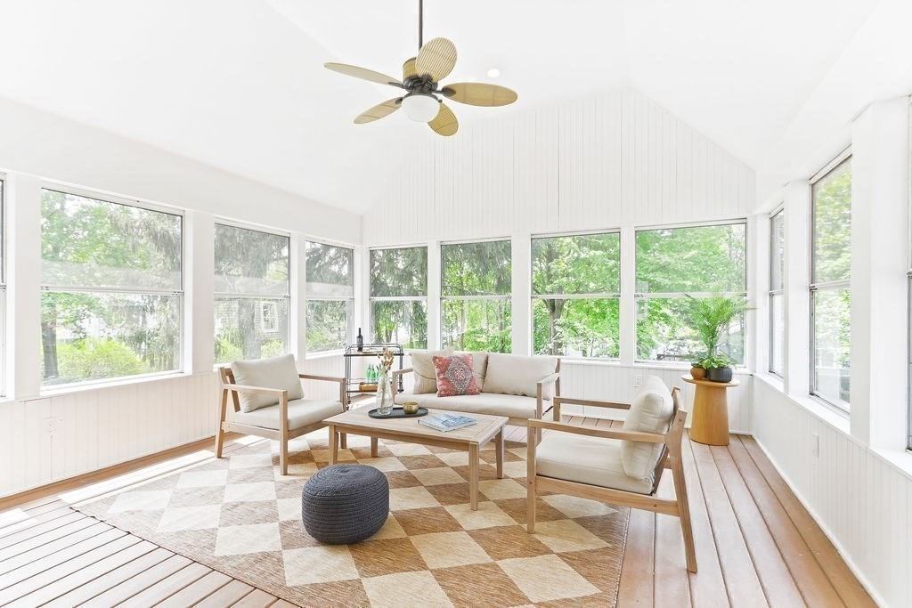 1097 Greendale Avenue Needham, MA 02492 - Photo 20 of 36 a living room with furniture and a floor to ceiling window