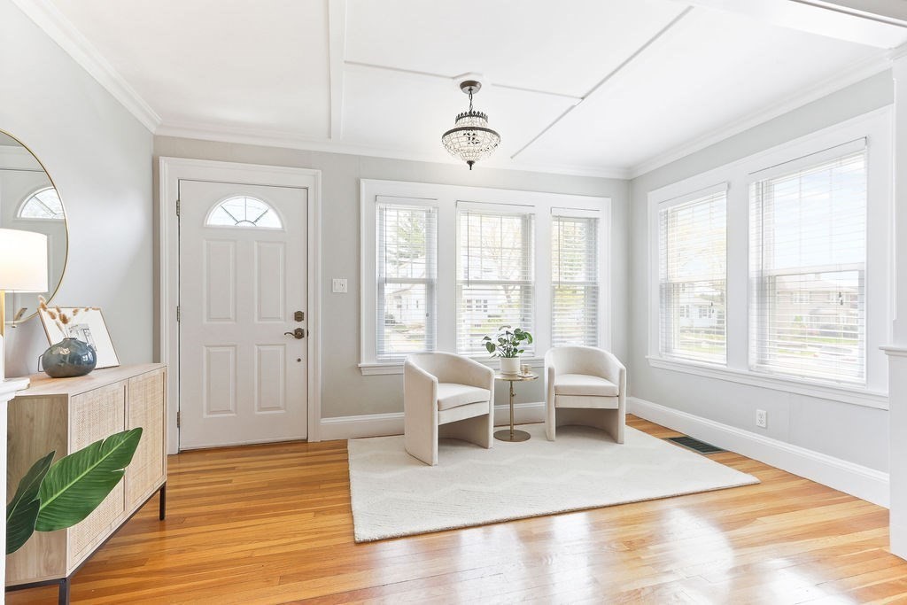 1097 Greendale Avenue Needham, MA 02492 - Photo 4 of 36 a living room with furniture and a large window