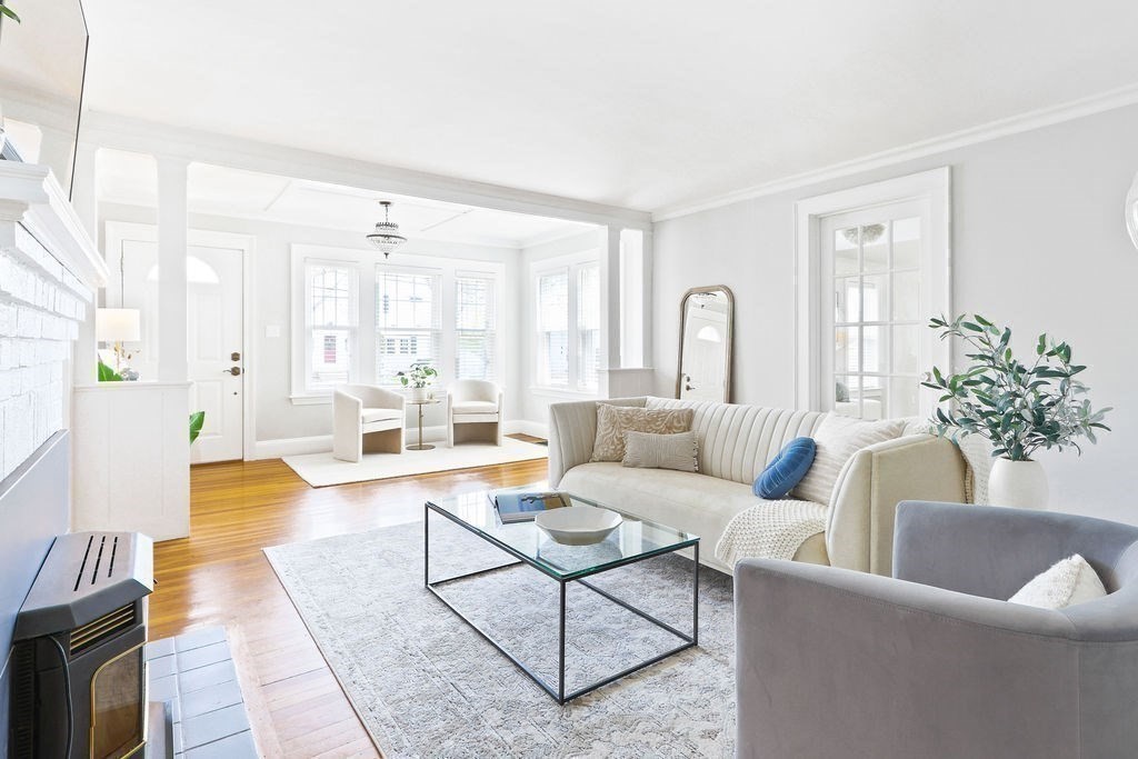 1097 Greendale Avenue Needham, MA 02492 - Photo 8 of 36 a living room with furniture and a large window